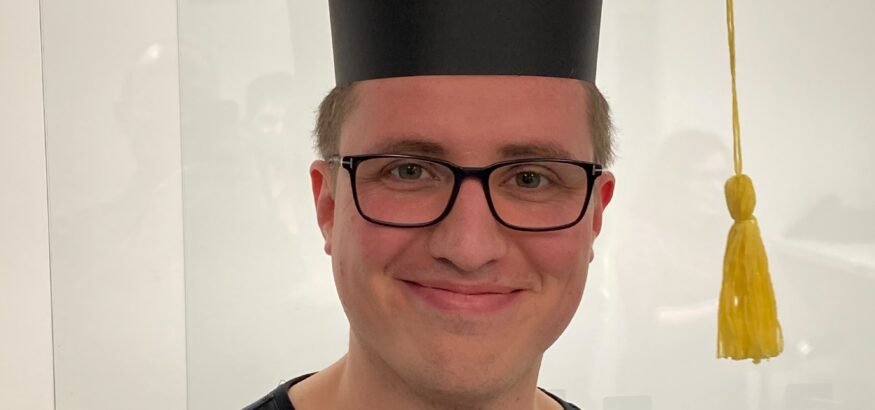 Soeren with his PhD hat